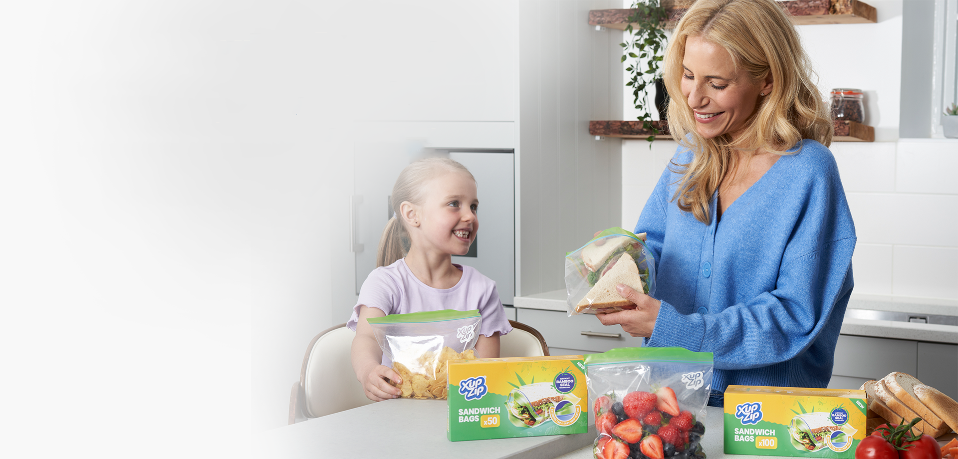 Mother and daughter preparing food together